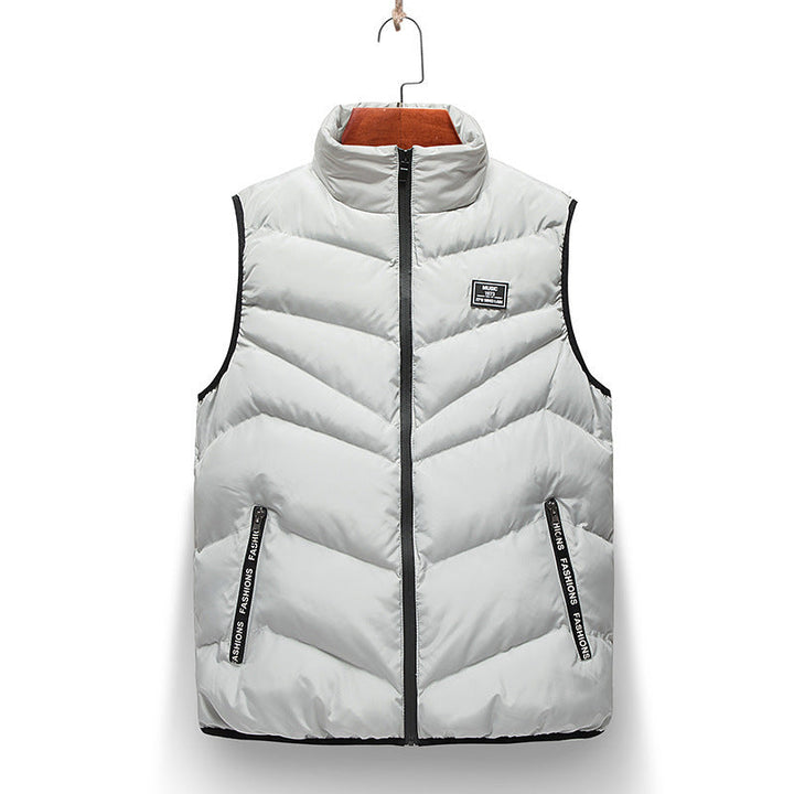 Modern women's quilted vest with a high collar, offering warmth and style with side zip pockets.