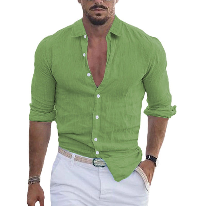 Man in a stylish lightweight men's shirt with rolled sleeves, enjoying a casual summer day.