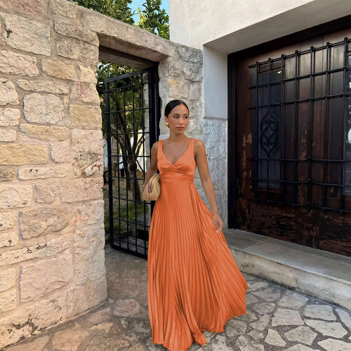 Sophisticated women's V-neck pleated midi dress, perfect as occasion wear. Elegant and sleeveless.