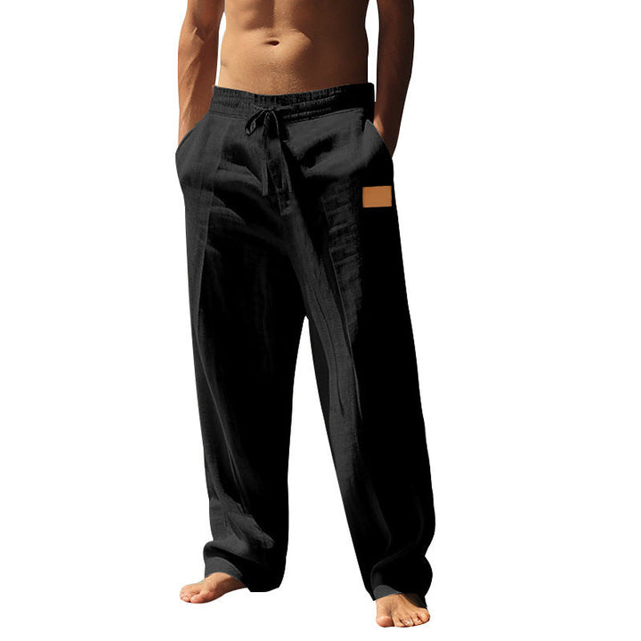 Relaxed fit men's vacation pants, comfortable and breathable beachwear essential.