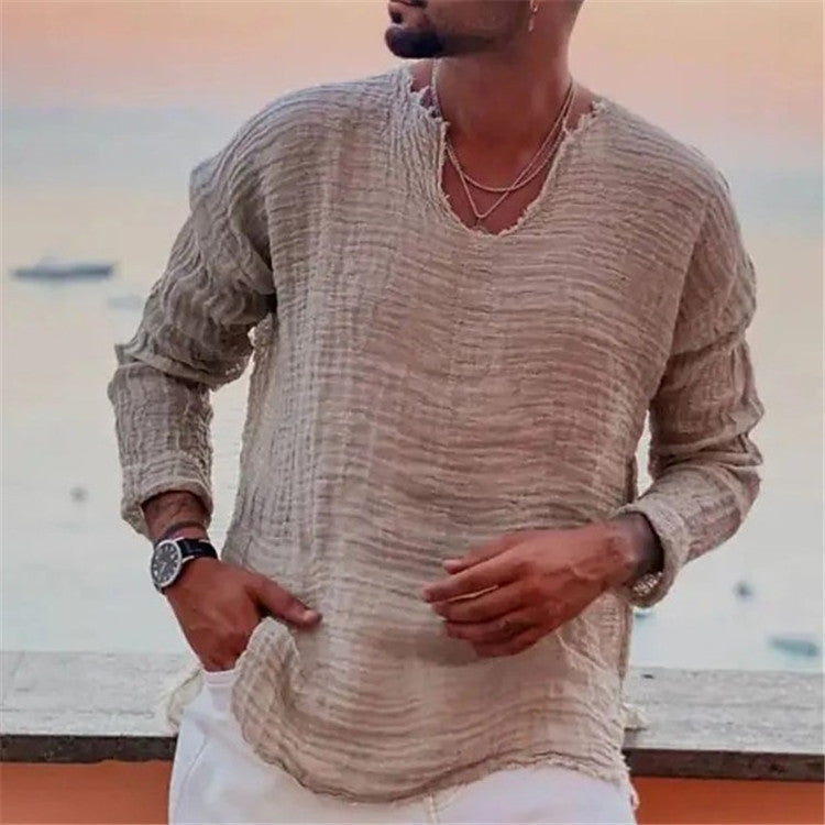 Men's V-neck short sleeve shirt in a casual setting, embodying relaxed summer fashion & comfort.