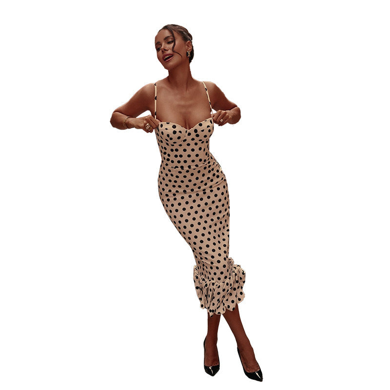 Classic polka dot women's midi dress with a chic voluminous hem, perfect for versatile spring & summer styling.