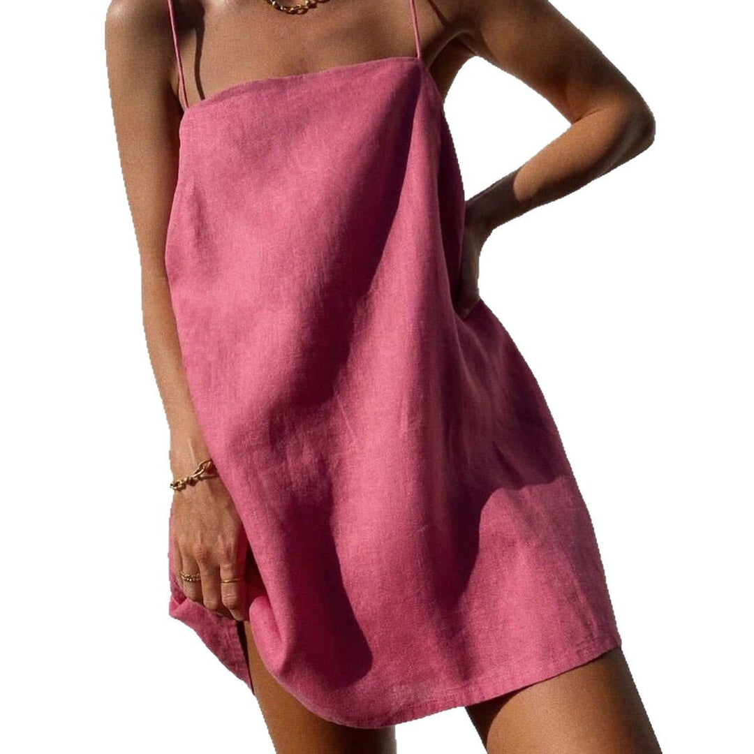 Stylish women's summer midi sundress with delicate spaghetti straps & pockets, an elegant choice for any occasion.