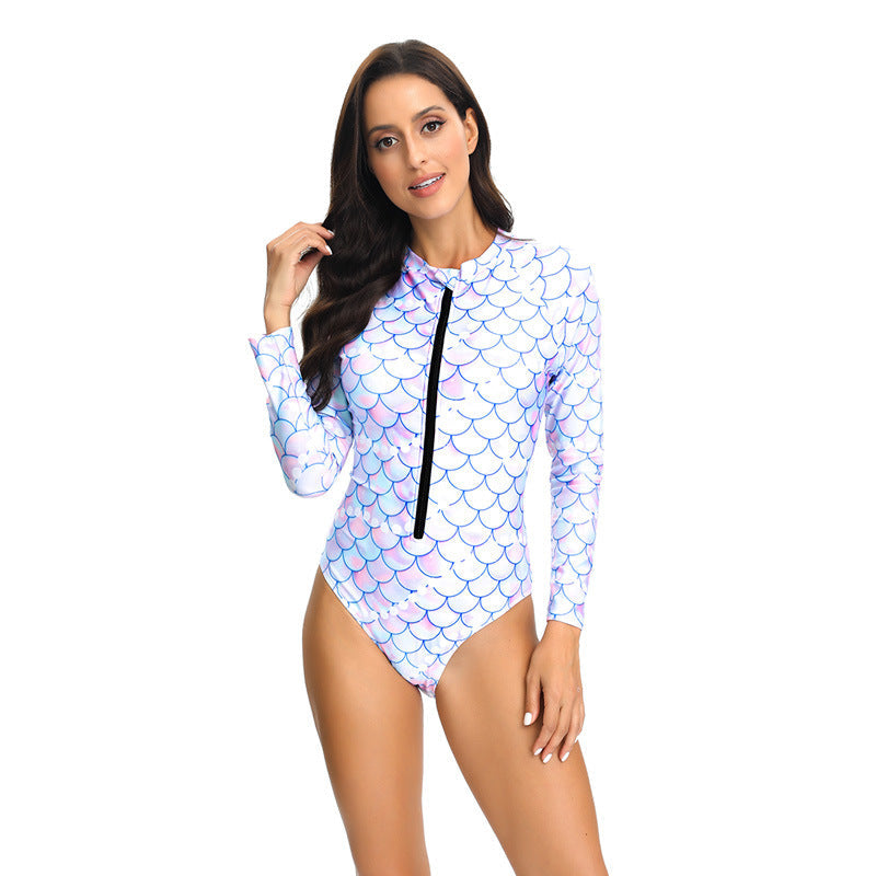 One-piece women's long sleeve swimsuit with zip, offering quick-dry comfort & sun protection.