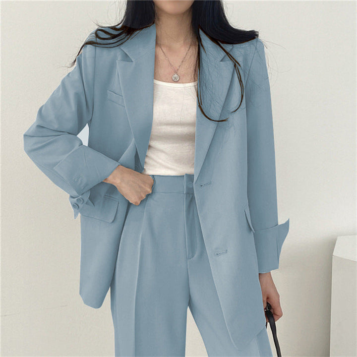 Chic women's tailored fashion, an elegant blazer and trouser duo for success.
