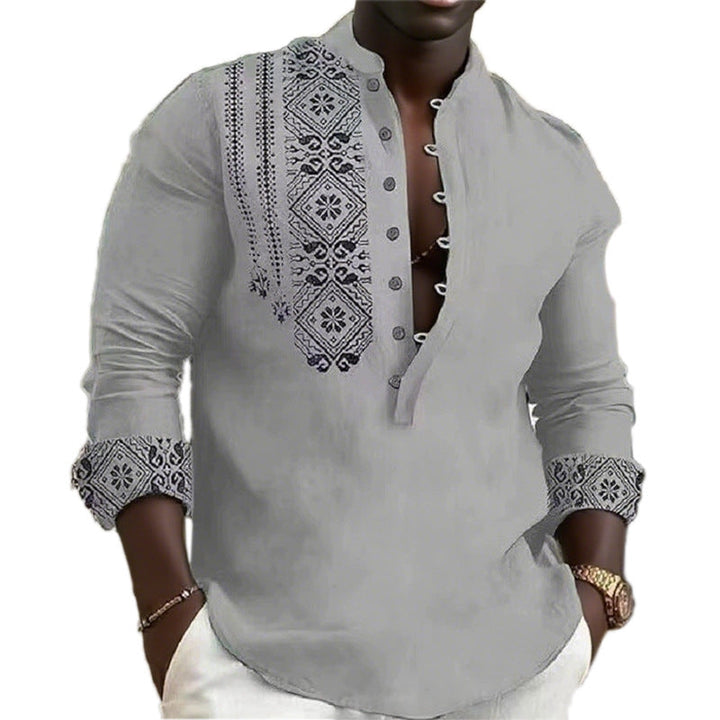 Close-up of men's long sleeve ethnic print shirt, featuring intricate patterns and a modern, versatile design.