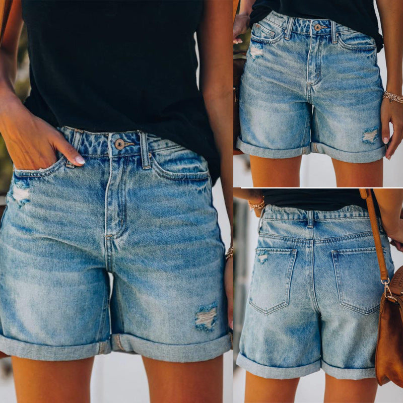 Light blue women's distressed denim shorts with stylish rolled hem, perfect for casual summer wear.