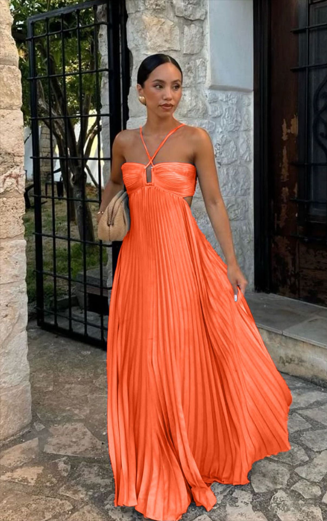 Classy black women's off-shoulder party dress, with a chic pleated silhouette & delicate, secure straps.
