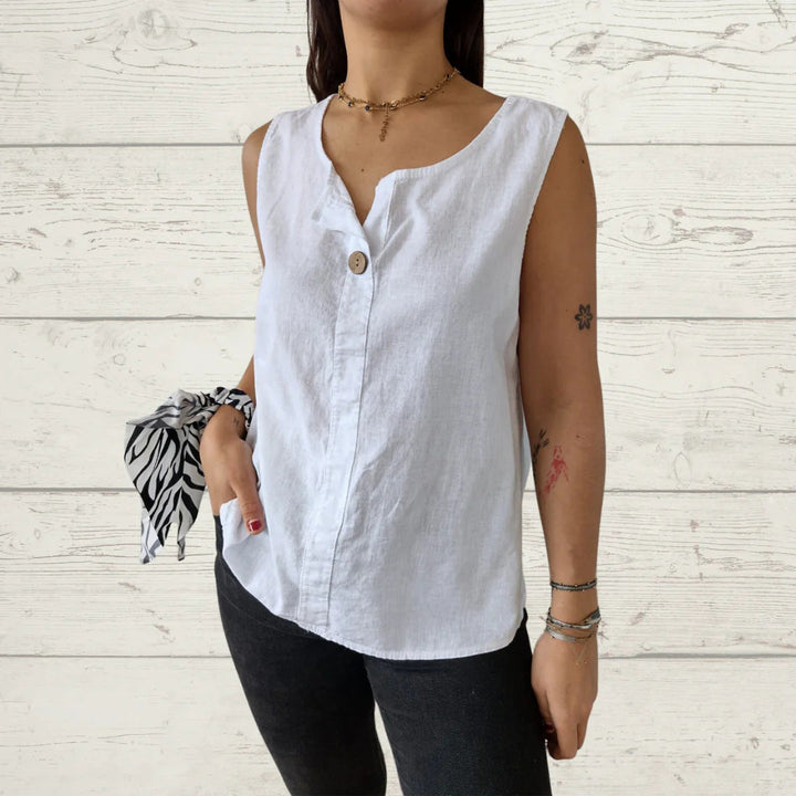 Women's lightweight sleeveless blouse with button details. Perfect for summer casual & elegant wear.