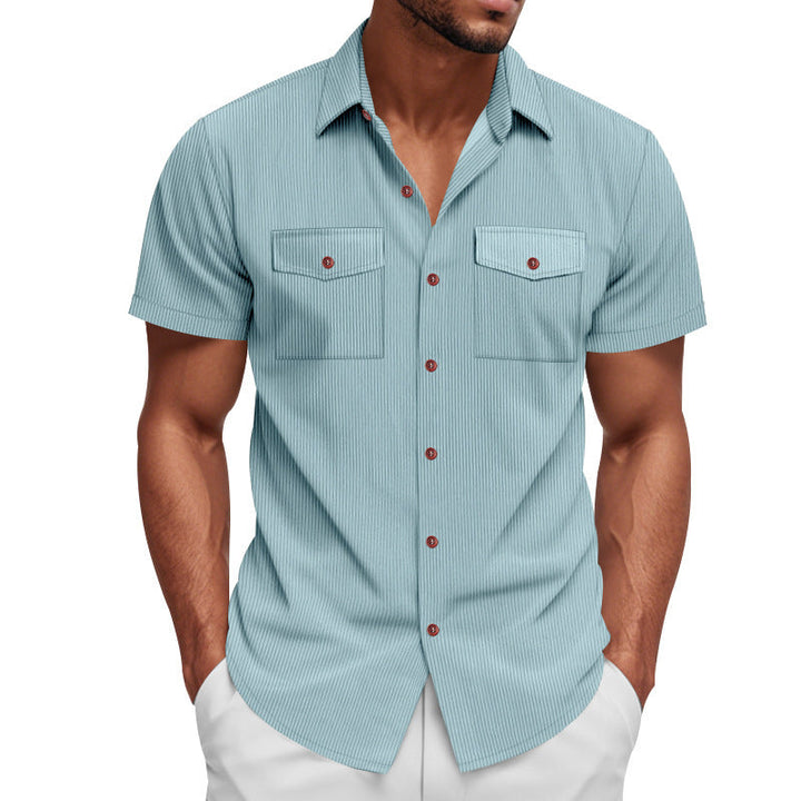 Comfortable men's short sleeve striped shirt. This stylish top includes dual chest pockets for summer fashion.