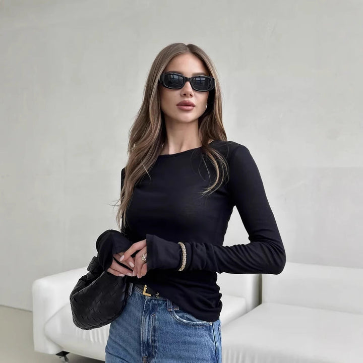 Stylish women's long sleeve crew neck t-shirt. Elegant casual top for versatile everyday wear & seasonal layering.