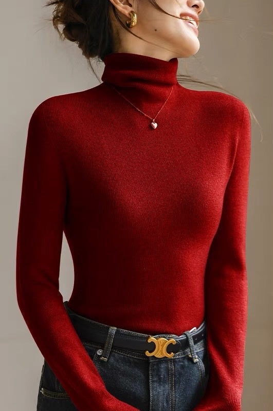 Versatile women's slim fit high neck sweater, seamless design, great for elegant office wear or casual outings.