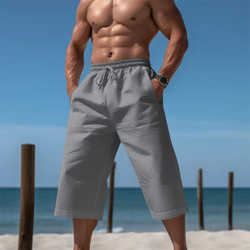Comfortable men's summer shorts with pockets, great for beach days & relaxed outings.