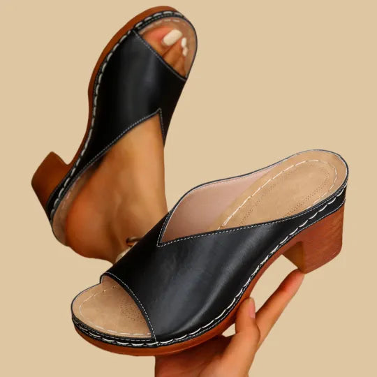 Versatile unisex orthopedic sandals with chunky high heel, providing arch support & all-day comfort.