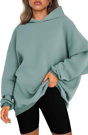 Warm & comfortable women's oversized hoodie, perfect for chilly fall and winter days.