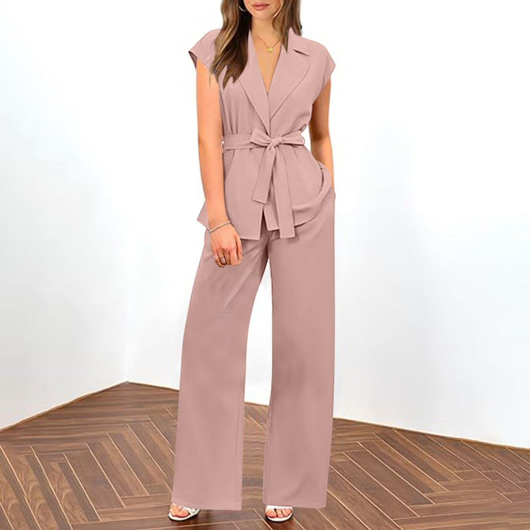 Elegant women's pink summer blazer and trouser set, ideal for formal or stylish casual wear. Stretch fabric.