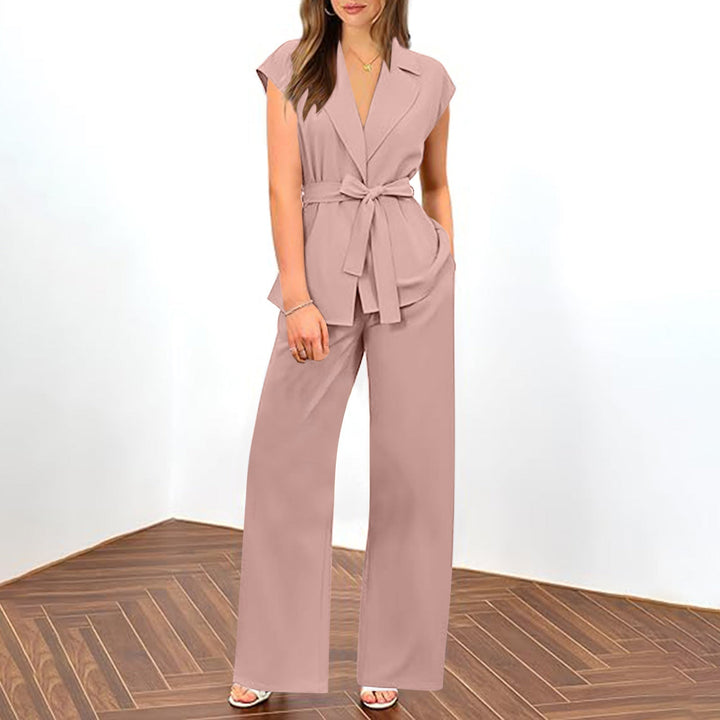 Elegant women's pink summer blazer and trouser set, ideal for formal or stylish casual wear. Stretch fabric.