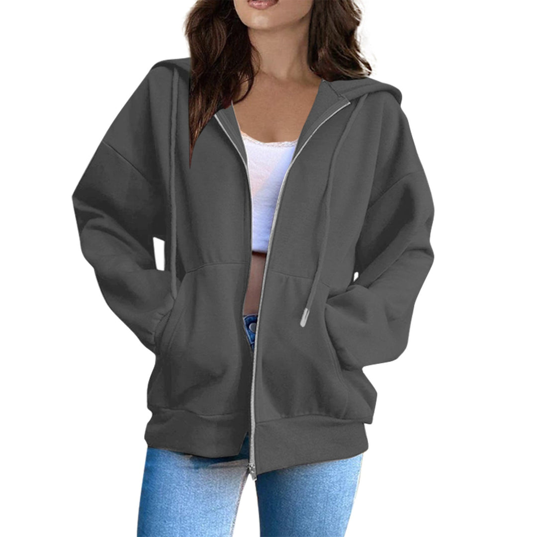 Trendy women's oversized hooded sweatshirt. Perfect for a relaxed, stylish autumn look.