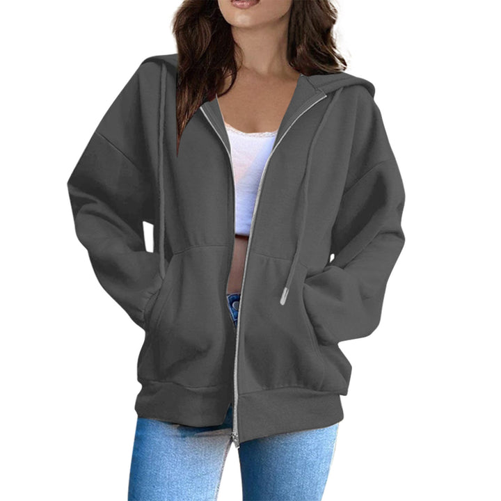 Trendy women's oversized hooded sweatshirt. Perfect for a relaxed, stylish autumn look.