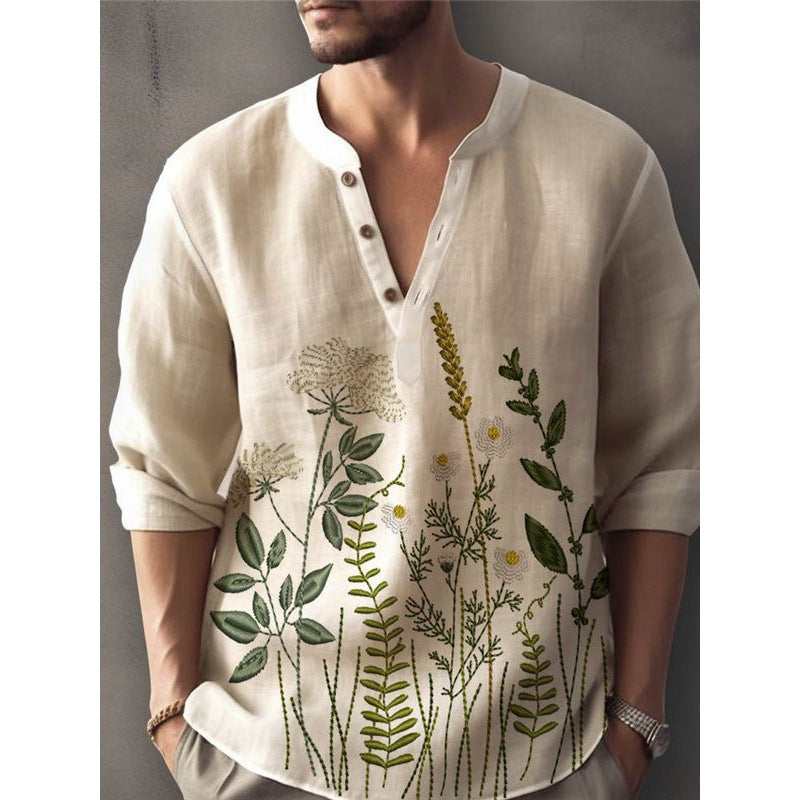 Close-up of a men's button-down shirt, highlighting exquisite floral embroidery and long sleeve design.