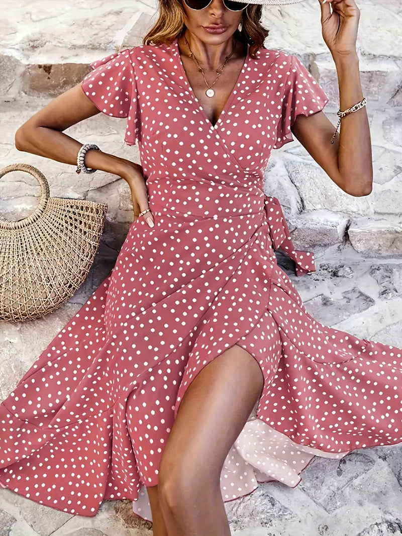 Playful polka dot wrap mini dress for women, offering a chic and comfortable summer look.