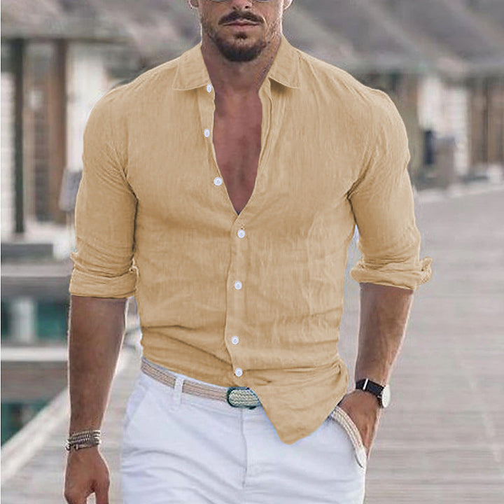 A versatile men's lightweight button-up shirt, suitable for various casual and warm weather outfits.