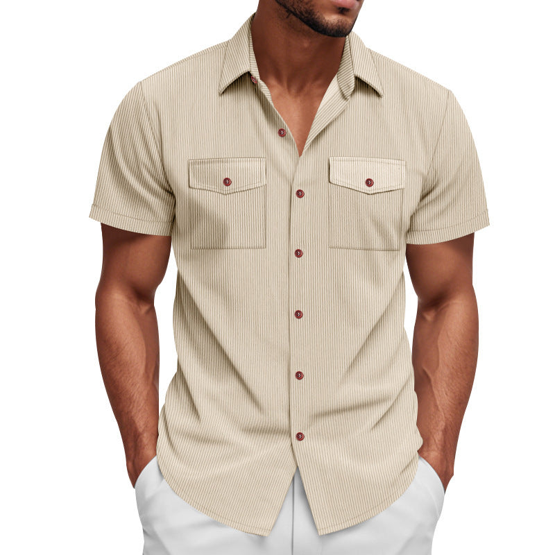 Fashionable men's striped short sleeve top featuring practical dual chest pockets for a modern casual look.