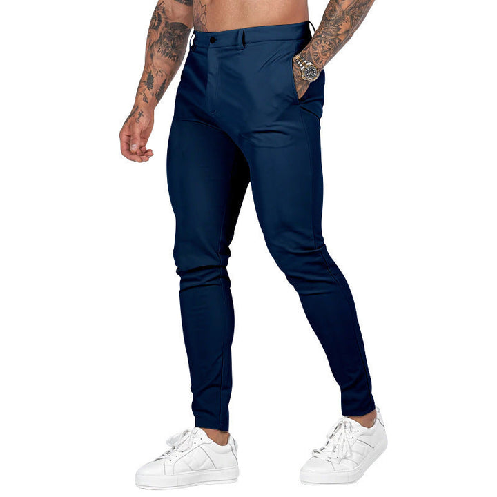 Detail: Comfortable waistband & button closure on men's slim-fit stretch trousers for a secure fit.