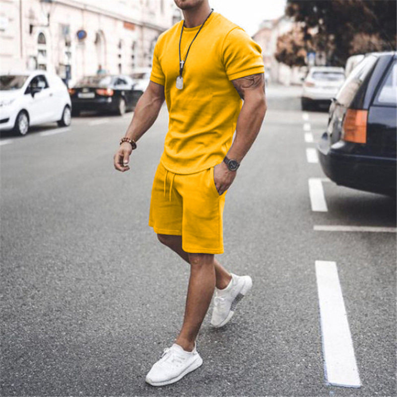 Men's two-piece activewear: quick-dry tee & shorts for ultimate summer comfort.