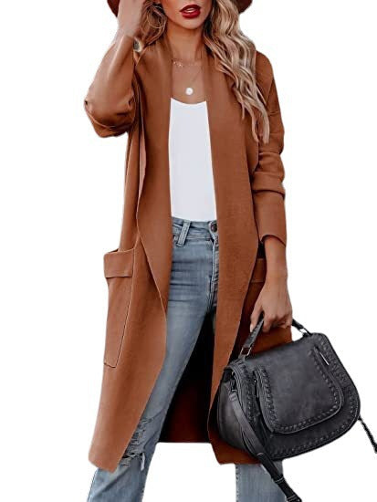 Stylish women's long open cardigan with pockets, great for casual or elegant outfits.