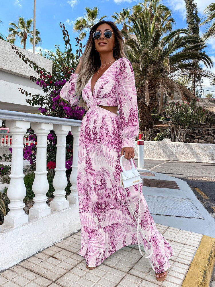 Colorful floral print V-neck maxi dress for women with elegant ruffled hem. Summer fashion.