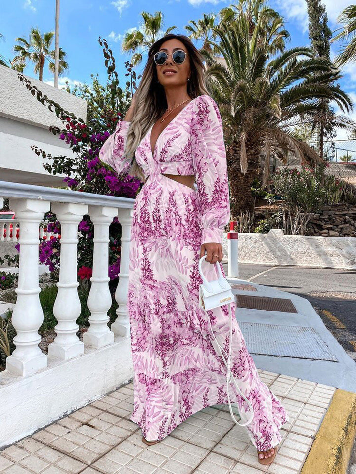 Colorful floral print V-neck maxi dress for women with elegant ruffled hem. Summer fashion.