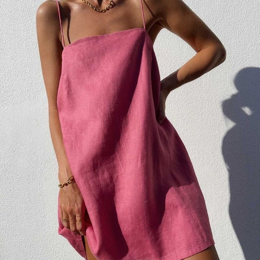 Versatile women's summer sundress, features spaghetti straps, A-line cut & essential pockets for a chic look.