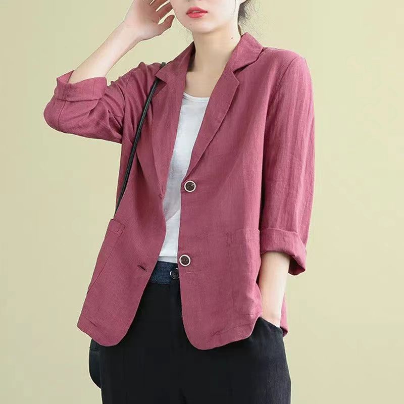 Tailored women's elegant casual blazer, a fashion jacket with stylish contrast buttons for a polished look.