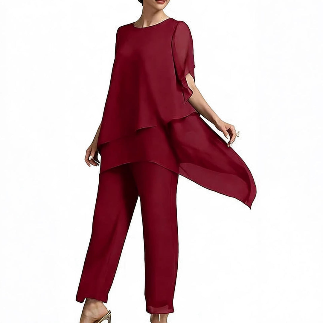 Versatile women's elegant two-piece set with airy sleeves, ideal for sophisticated events.