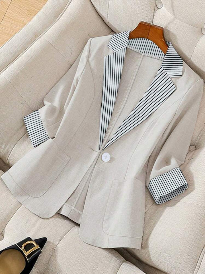 Women's elegant oversized blazer, a lightweight long sleeve jacket for chic and comfortable wear.