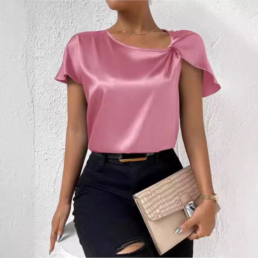 Versatile women's casual t-shirt top. Solid color, round neck, & fashionable front knot detail.