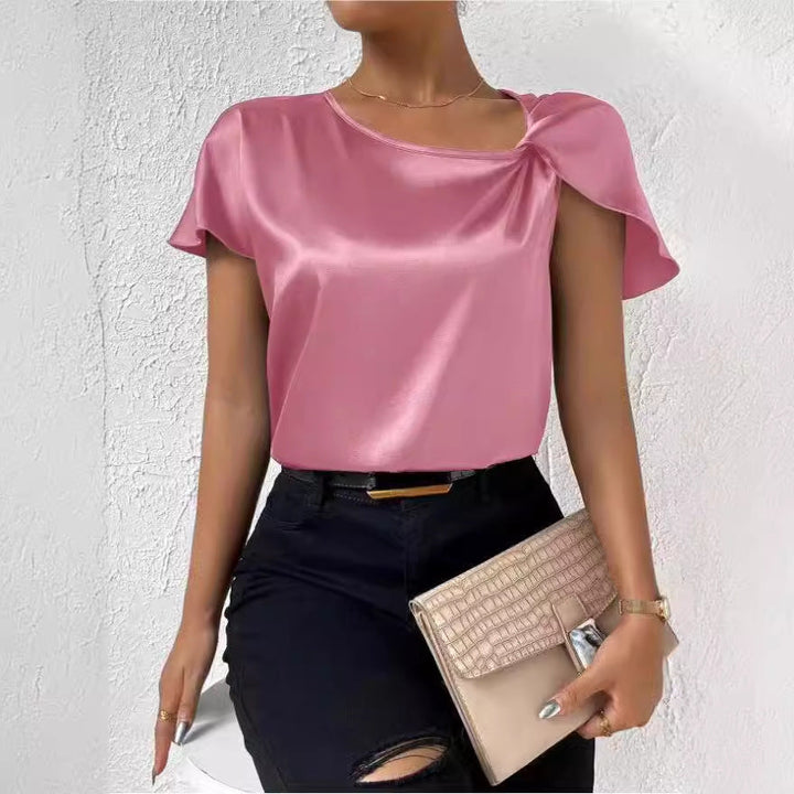Versatile women's casual t-shirt top. Solid color, round neck, & fashionable front knot detail.