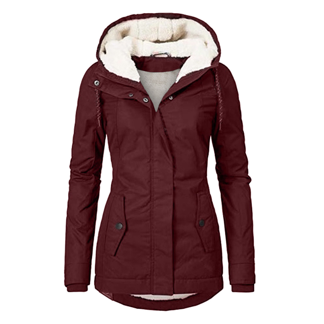 Soft, cozy women's hooded winter jacket in a stylish cut, perfect for warmth and casual everyday fashion.