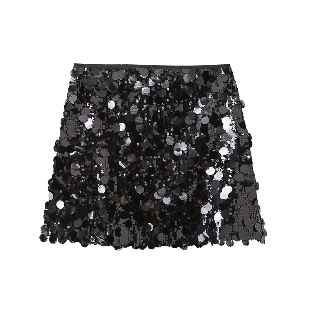Silver sequin mini skirt, a dazzling & glamorous women's party skirt. Perfect for evening wear & special occasions.