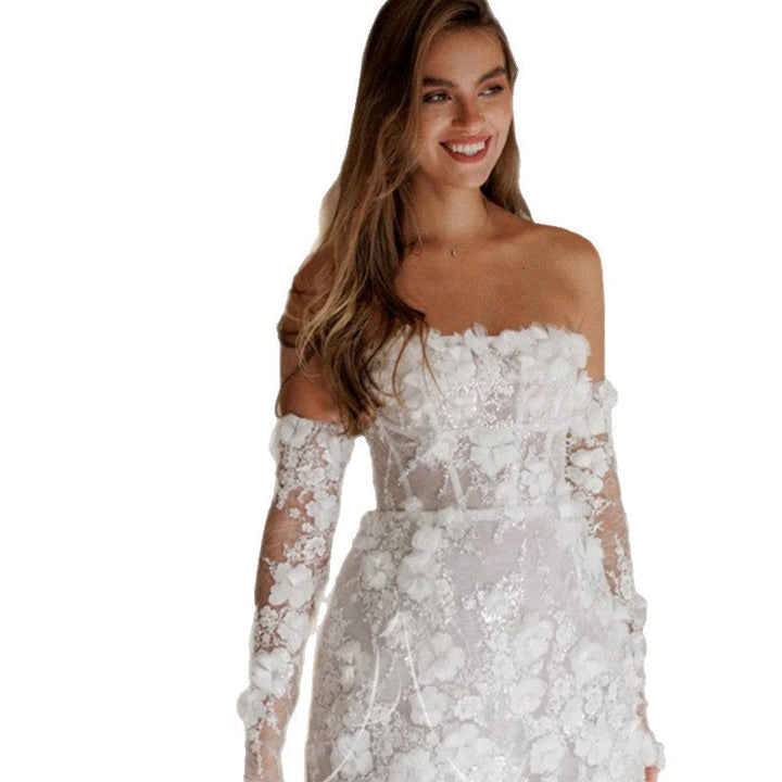 White floral wedding dress for women, adorned with elegant sheer sleeves and exquisite floral details, a bridal must-have.