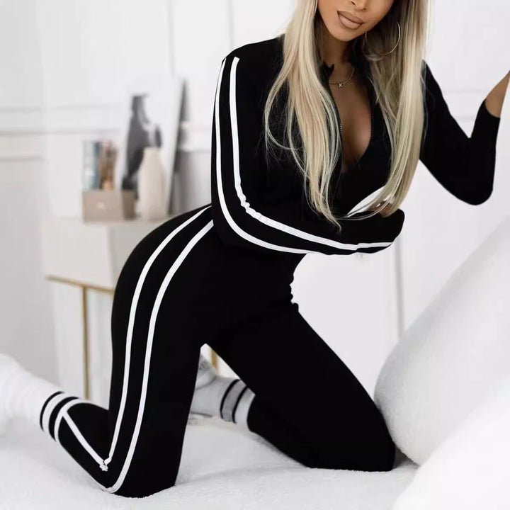 Athletic women's long sleeve striped bodysuit, ideal gym wear and sleek leisurewear.