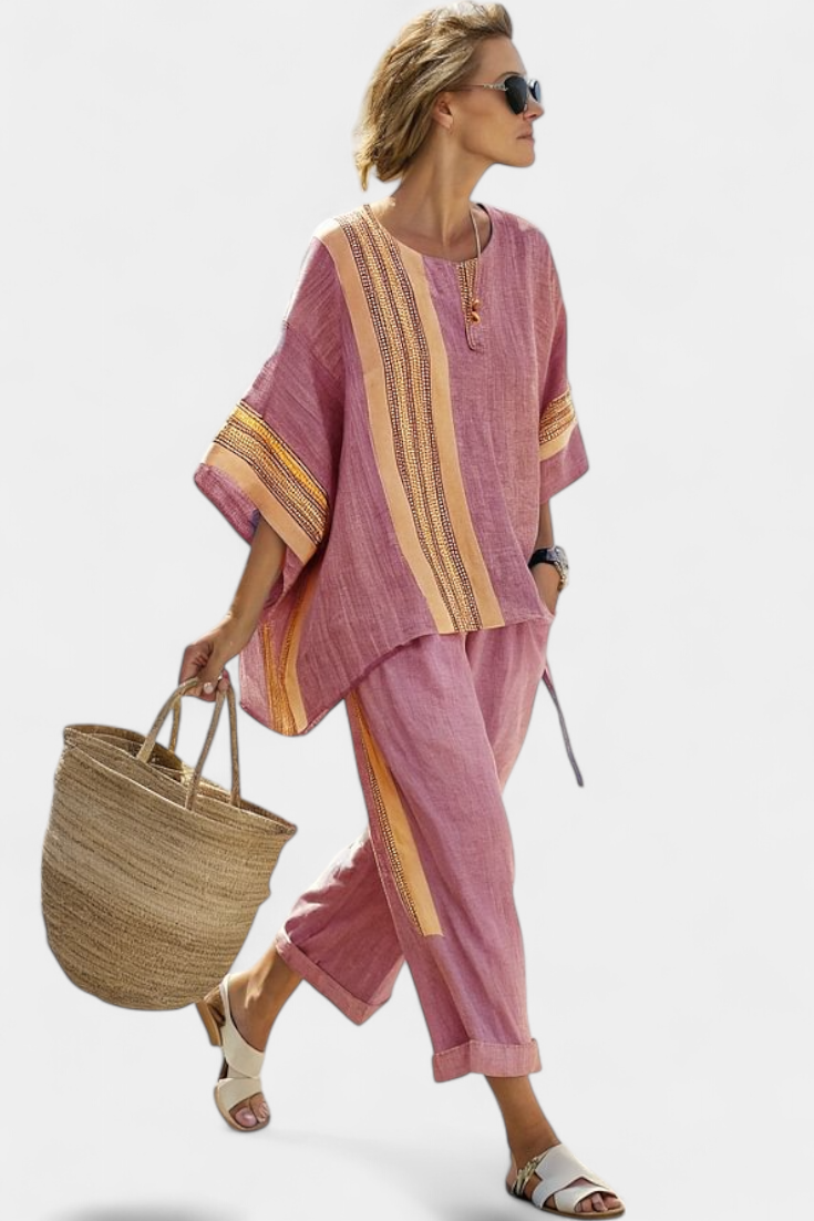 Stylish women's striped top and matching pants set, offering a relaxed fit for trendy summer apparel.