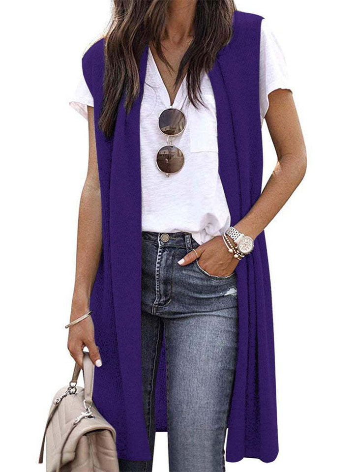 Women's long casual vest with practical pockets, an elegant and versatile sleeveless outerwear option.
