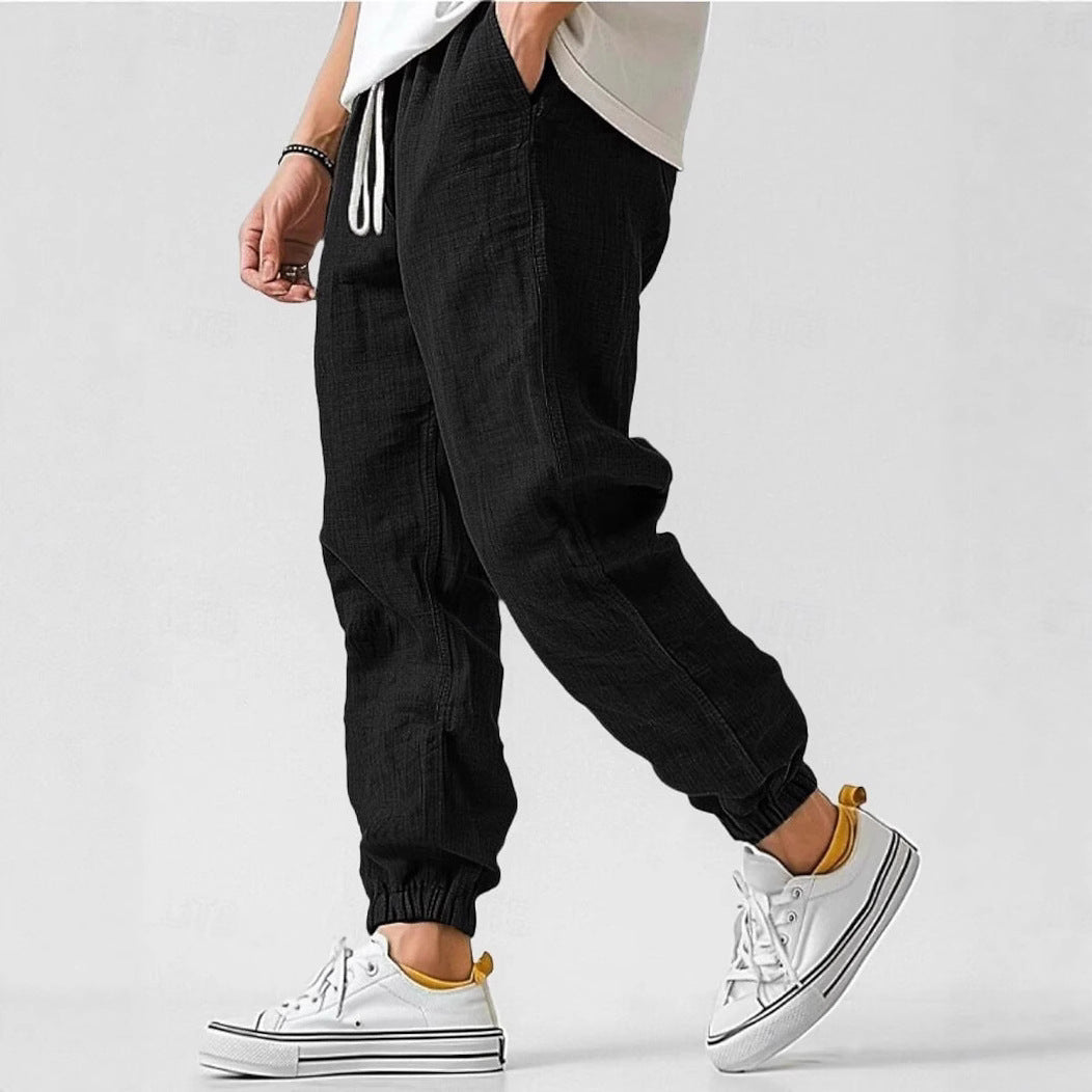 Everyday men's casual trousers featuring a comfortable elastic waist & convenient side pockets.