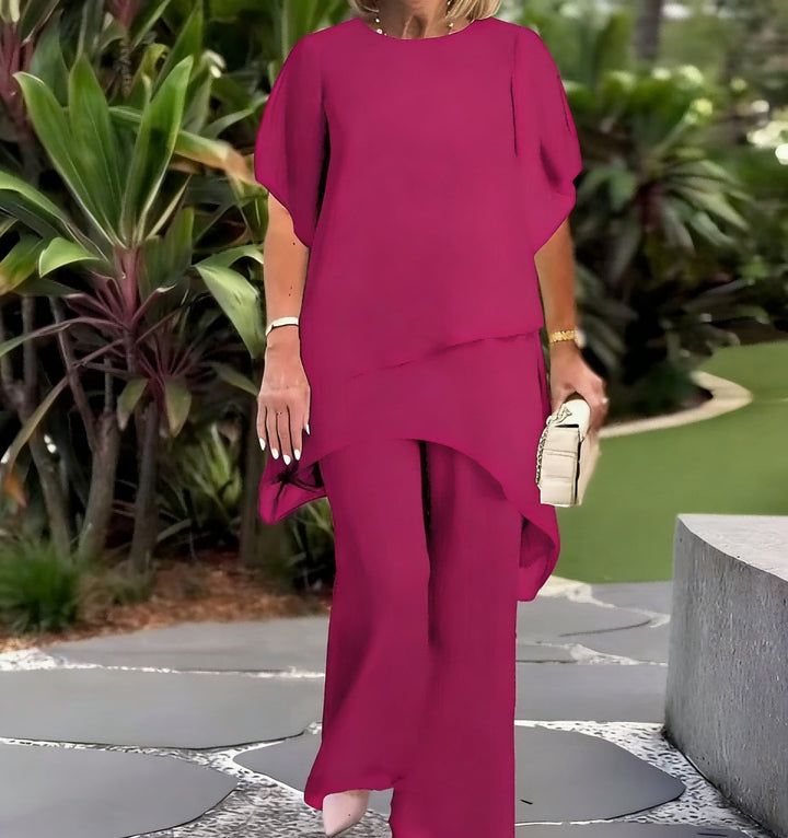 Chic women's two-piece outfit with elegant design & flowing airy sleeves, great for spring fashion.