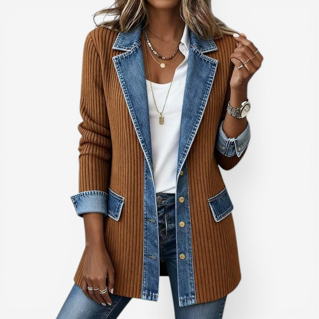 Stylish women's layered collar jacket with elegant button detailing. A chic piece of contemporary outerwear.