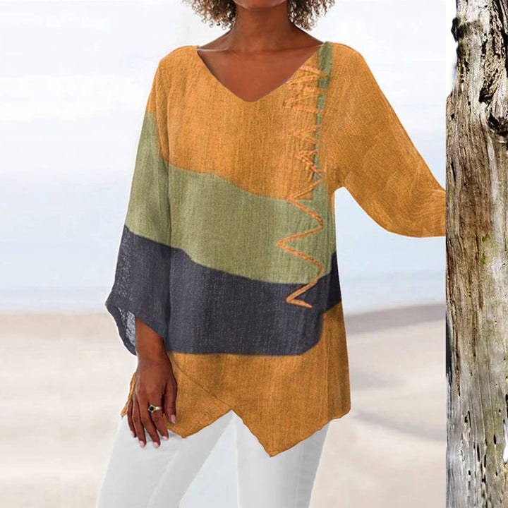 Stylish women's geometric short-sleeve blouse, an easy-care fashion top for casual outings & spring/summer wear.