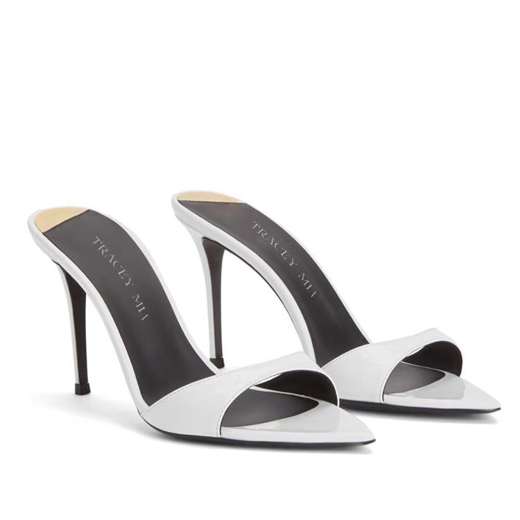 Formal women's footwear: high-heel stiletto, pointed toe, open back, offering elegant style.