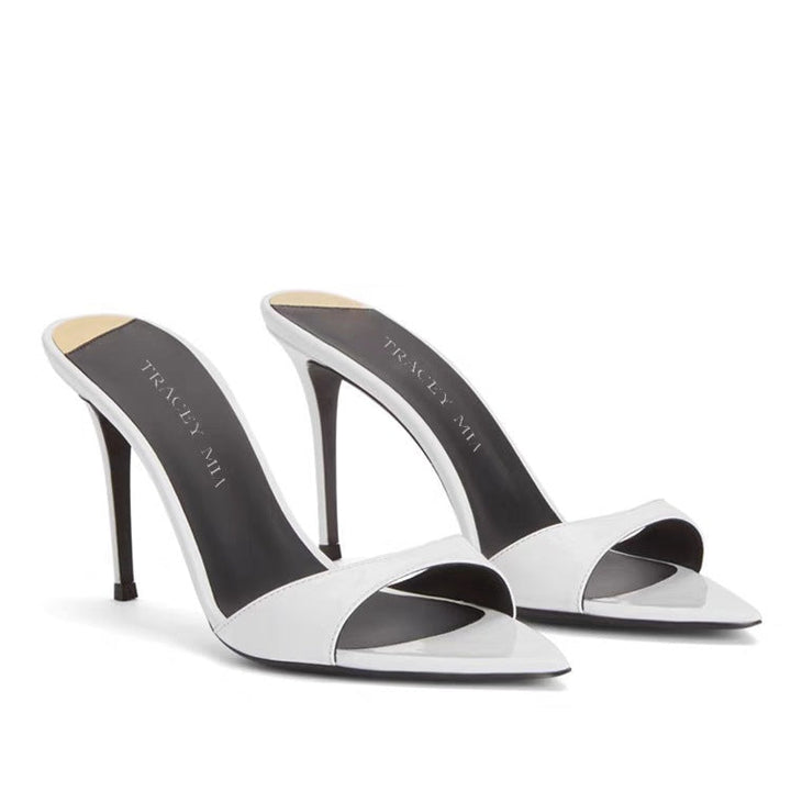 Formal women's footwear: high-heel stiletto, pointed toe, open back, offering elegant style.
